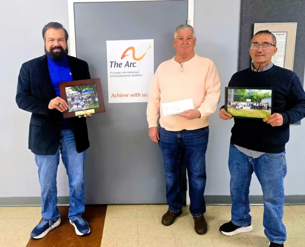Hab’s Cafe reunion donates to The Arc